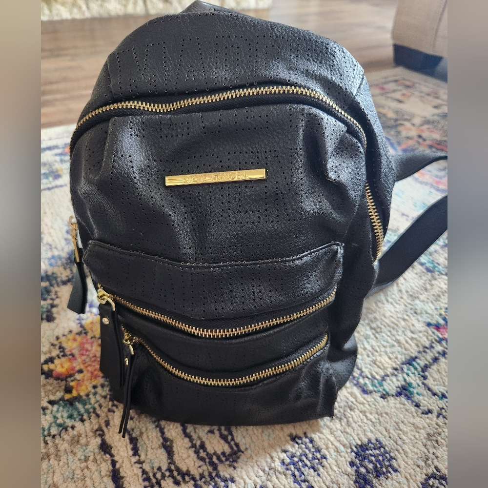 Steve Madden Black Perforated Backpack with Gold Zippers